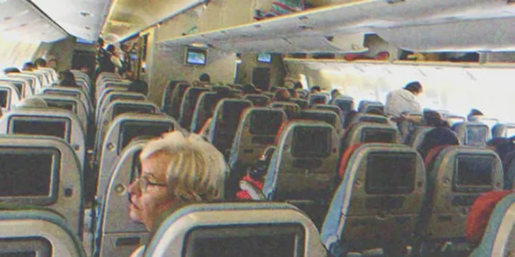 The inside of a plane full of passengers | Source: Shutterstock
