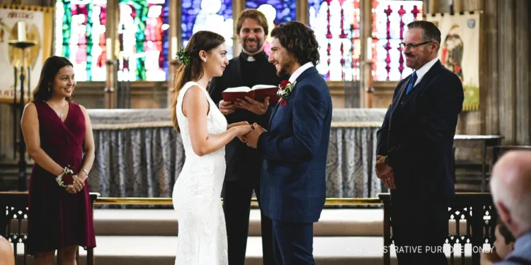A couple at the altar | Source: Shutterstock